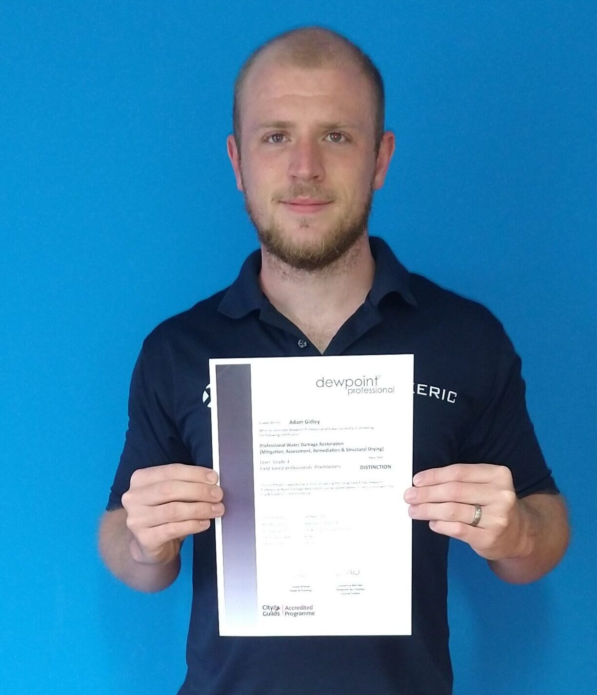 Adam Gidley, Xeric receiving his DISTINCTION after attending the Grade 3 – Water Damage Restoration Course.